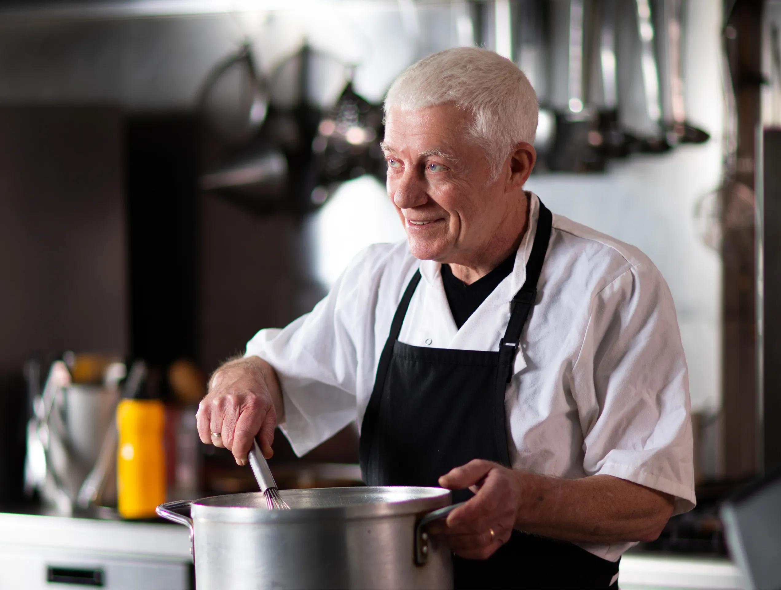 Portrait photo of a male UK Armed Forces veteran working in a kitchen.